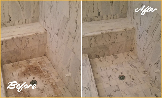 Before and After Picture of a Dirty Bridgeville Marble Shower Cleaned to Eliminate Dark Stains